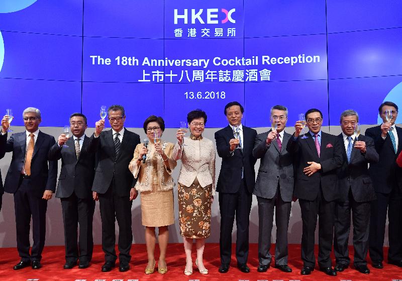 The Chief Executive, Mrs Carrie Lam, attended the cocktail reception to celebrate the 18th anniversary of Hong Kong Exchanges and Clearing Limited (HKEX) today (June 13). Photo shows (from second left) Deputy Commissioner of the Ministry of Foreign Affairs of the People's Republic of China in the Hong Kong Special Administrative Region (HKSAR) Mr Yang Yirui; the Financial Secretary, Mr Paul Chan; the Chairman of HKEX, Mrs Laura Cha; Mrs Lam; the Chief Executive of HKEX, Mr Charles Li; Deputy Director of the Liaison Office of the Central People's Government in the HKSAR Mr Huang Lanfa; Chairman of the Securities and Futures Commission, Mr Carlson Tong; and other officiating guests proposing a toast.
