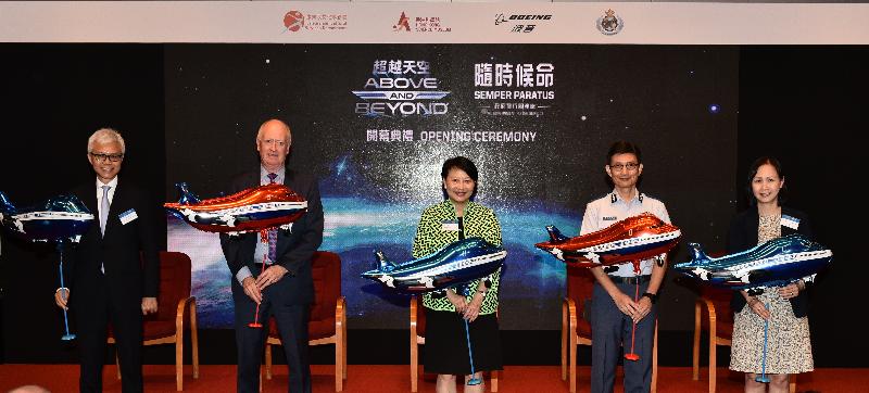 The opening ceremony for the exhibitions "Above and Beyond" and "Semper Paratus - The Government Flying Service" was held today (June 14) at the Hong Kong Science Museum. Photo shows (from left) the officiating guests at the ceremony - the Acting Director of Leisure and Cultural Services, Dr Louis Ng; the Boeing Company's Vice President of Communications, Mr Charlie Miller; the Permanent Secretary for Home Affairs, Mrs Cherry Tse; the Controller of the Government Flying Service, Captain Michael Chan; and the Museum Director of the Hong Kong Science Museum, Ms Paulina Chan.