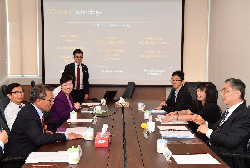 The Secretary for Financial Services and the Treasury, Mr James Lau (front right), meets with the Vice Chancellor and President of the Chinese University of Hong Kong, Professor Rocky Tuan (front left), and his senior staff members today (June 19). They gave an overview of the Bachelor of Engineering Programme in Financial Technology, the first of its kind in Hong Kong. 