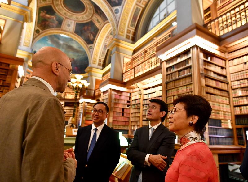 The Chief Executive, Mrs Carrie Lam, continued her visit to France in Paris today (June 20, Paris time). Photo shows Mrs Lam (first right), accompanied by the Secretary for Commerce and Economic Development, Mr Edward Yau (second right); and the Secretary for Innovation and Technology, Mr Nicholas W Yang (third right) touring the National Assembly of France.
