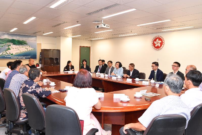 The Secretary for Food and Health, Professor Sophia Chan, visited Tung Chung today (June 21). Professor Chan (fourth right) is pictured meeting with Islands District Council members to listen to their views on various healthcare and environmental hygiene issues in the district. Looking on is the Chairman of the Islands District Council, Mr Chow Yuk-tong (third right), and the District Officer (Islands), Mr Anthony Li (fifth right).