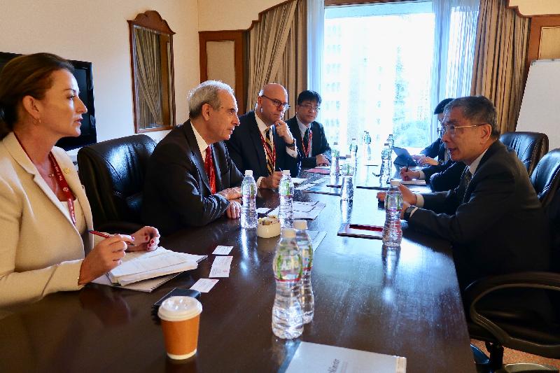 The Secretary for Financial Services and the Treasury, Mr James Lau (right), today (June 25) attended the Third Annual Meeting of the Board of Governors of the Asian Infrastructure Investment Bank (AIIB) in Mumbai, India. He met with the AIIB Vice President and Chief Financial Officer, Mr Thierry de Longuemar (second left), to exchange views on Hong Kong's strengths in infrastructure financing.