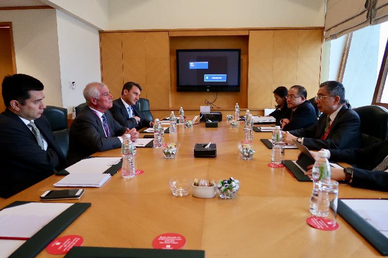 The Secretary for Financial Services and the Treasury, Mr James Lau (first right), today (June 25) attended the Third Annual Meeting of the Board of Governors of the Asian Infrastructure Investment Bank in Mumbai, India. He met with the Vice Chairman of HSBC's Global Banking, Mr Kevan Watts (second left), to discuss Hong Kong's green finance development.