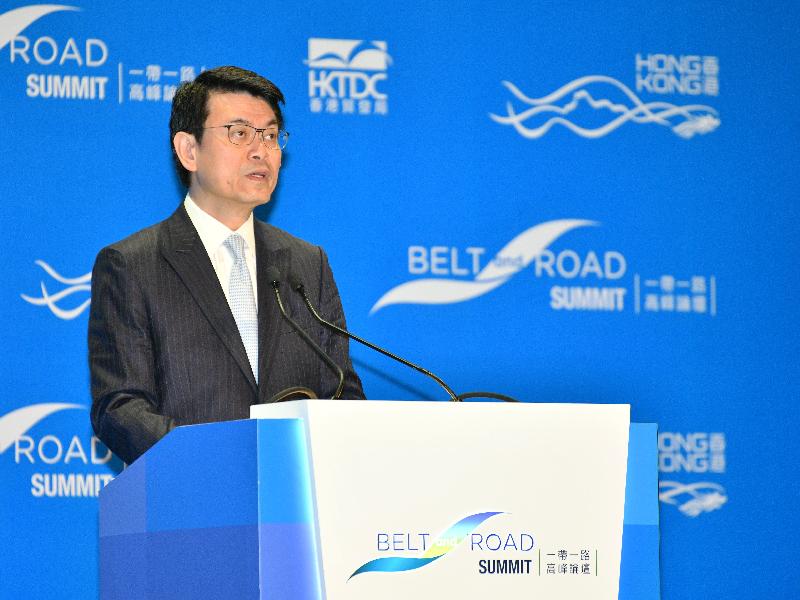 The Secretary for Commerce and Economic Development, Mr Edward Yau, delivers a lead-in speech at the plenary session on "Action through Collaboration: Case Studies on Signature Belt and Road Projects" of the third Belt and Road Summit today (June 28).