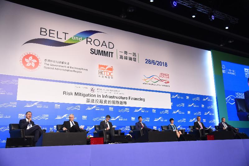 Deputy Chief Executive of the Hong Kong Monetary Authority and Director of the Infrastructure Financing Facilitation Office Mr Eddie Yue (first left) moderates a panel discussion themed "Risk Mitigation in Infrastructure Financing" at the Belt and Road Summit today (June 28). The other panel speakers are (from second left) the Chief Operating Officer of Global Infrastructure Hub, Mr Mark Moseley; Co-Head of the Infrastructure and Real Estate Group, Asia-Pacific, the Hongkong and Shanghai Banking Corporation Limited, Mr James Cameron; the Head of Credit Lines, Asia Pacific, Zurich Insurance Company Ltd, Mr Tim Warren; the Chief Representative, Hong Kong Representative Office, the Export-Import Bank of China, Ms Wen Hong; the PRC Leader and Senior Vice President, Asia Pacific, AECOM, Mr Ian Chung; and the Executive Director and Chief Financial Officer of CLP Holdings Limited, Mr Geert Peeters.