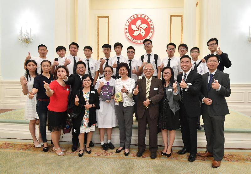 The Chief Executive, Mrs Carrie Lam, together with the Secretaries of Department and the Directors of Bureau met over 100 Hong Kong young people and students, who won international competitions in the past year, in a tea gathering at Government House this afternoon (July 1).  Photo shows Mrs Lam (front row, fifth right) poses for a photo with the participants.