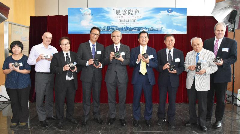 From left: the Assistant Manager of Orient Overseas Container Line Limited, Ms Connie Cheng; the Manning and Marine Manager of China LNG Shipping (International) Co Ltd, Mr John Wood; Fellow of the Photographic Society of Hong Kong Mr Chan Tat-kuen; Fellow of the Photographic Society of Hong Kong Mr Chan Ping-chung; the Director of the Hong Kong Observatory, Mr Shun Chi-ming; the Chief Executive Officer of the Airport Authority Hong Kong, Mr Fred Lam; the President of the Photographic Society of Hong Kong, Dr Lam Kui-chun; the Honorary President of the Photographic Society of Hong Kong, Dr Leo Wong; and the General Manager Operations of Cathay Pacific Airways, Mr Mark Hoey, officiate at the opening ceremony of the "Cloud-sourcing: In Touch with Weather from Land, Sea and Air" photo and video exhibition today (July 3).