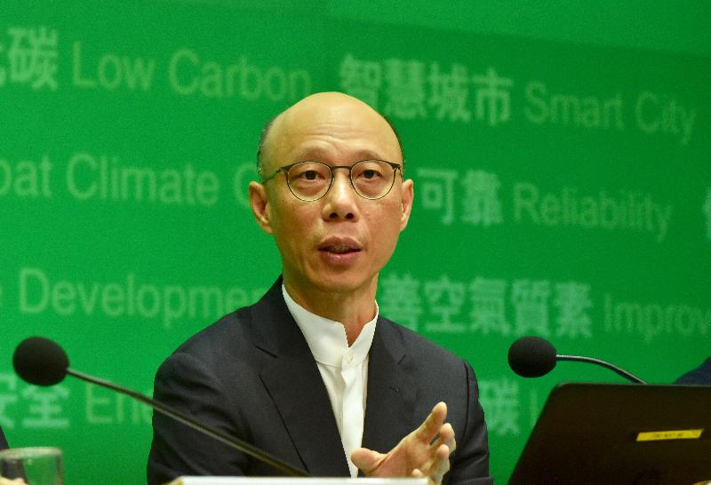 The Secretary for the Environment, Mr Wong Kam-sing, introduces the new Development Plans of the two power companies at a press conference today (July 3).