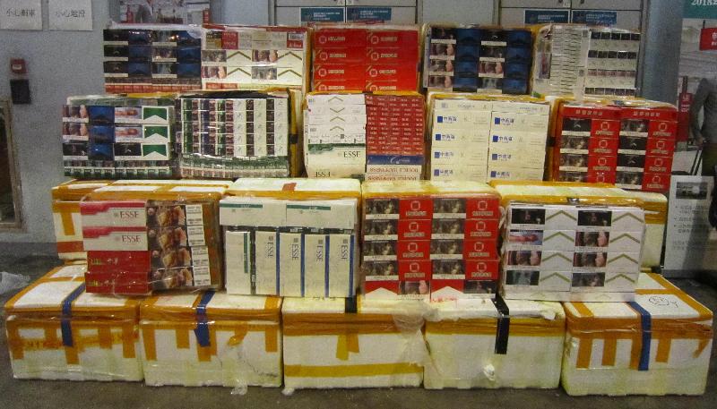 Hong Kong Customs seized about 500 000 suspected illicit cigarettes with an estimated market value of about $1.3 million and a duty potential of about $1 million at Man Kam To Control Point on July 3.
