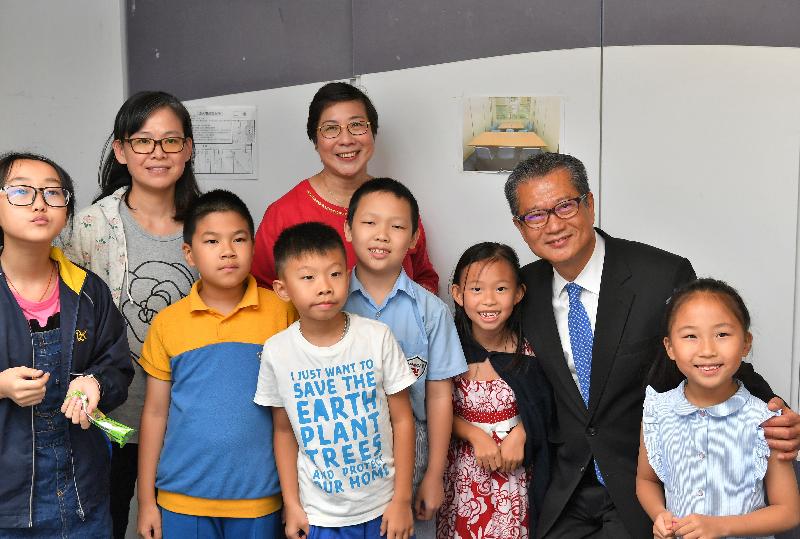The Financial Secretary, Mr Paul Chan (second right), today (July 5) visits Free Methodist Church Tuen Mun Children and Youth Integrated Services Centre. 