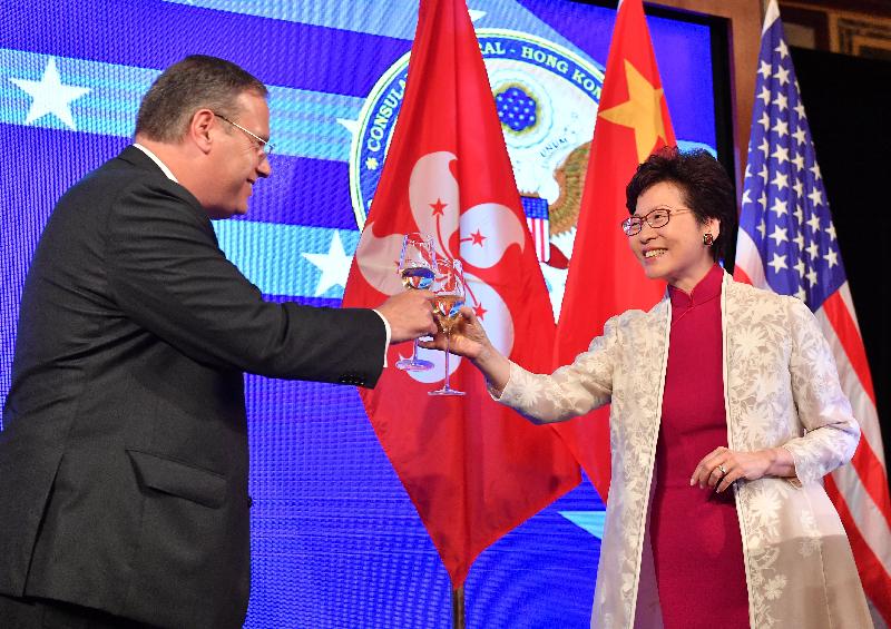 The Chief Executive, Mrs Carrie Lam (right), proposes a toast at a reception held by the United States (US) Consulate General in Hong Kong and Macau in celebration of US Independence Day today (July 5). Also pictured is the US Consul-General to Hong Kong and Macau, Mr Kurt Tong (left).
