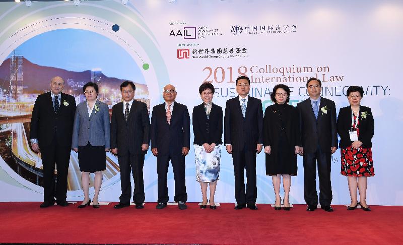 The Chief Executive, Mrs Carrie Lam, attended the 2018 Colloquium on International Law this morning (July 6). Photo shows Mrs Lam (centre); the Secretary for Justice, Ms Teresa Cheng, SC (third right); the Chairman of the Asian Academy of International Law (AAIL), Dr Anthony Neoh (first left); Founding Member of AAIL Dr Henry Cheng (fourth left); the Vice President of the International Court of Justice, Ms Xue Hanqin (second left); the President of the Chinese Society of International Law, Mr Huang Jin (second right); the Commissioner of the Ministry of Foreign Affairs of the People's Republic of China in the Hong Kong Special Administrative Region, Mr Xie Feng (fourth right); Deputy Director of the Liaison Office of the Central People's Government in the Hong Kong Special Administrative Region Mr Chen Dong (third left); and Standing Committee Member of the Chinese People's Political Consultative Conference, Dr Margaret Chan (first right), at the colloquium.
