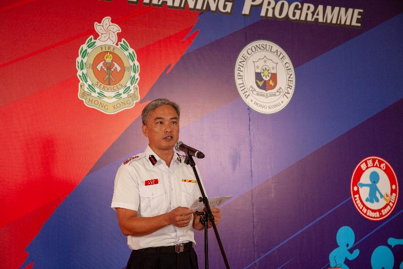 The  launch  ceremony  of  the  "Fire Safety x Press to Shock, Save a Life" training  programme  for foreign domestic helpers was  held  today  (July 8) at Sheung Wan Fire Station. Photo  shows  the  Director of Fire Services, Mr Li Kin-yat, addressing the ceremony.