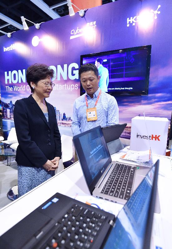 The Chief Executive, Mrs Carrie Lam, attended the RISE 2018 conference today (July 10). Photo shows Mrs Lam (left) touring a booth run by Invest Hong Kong.
