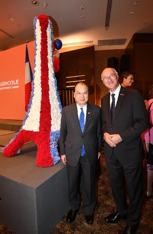 The Chief Secretary for Administration, Mr Matthew Cheung Kin-chung (left), is pictured with Consul General of France in Hong Kong and Macau, Mr Eric Berti, at the French National Day 2018 reception this evening (July 13).