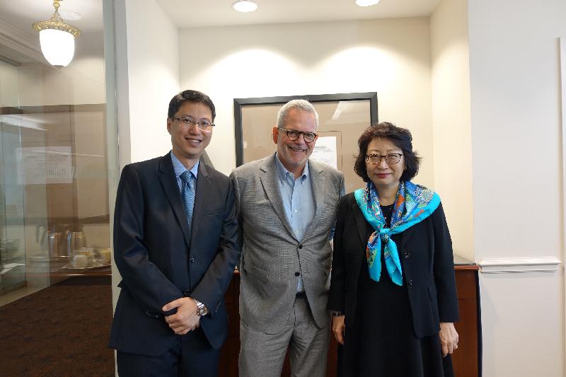 The Secretary for Justice, Ms Teresa Cheng, SC, (first right) meets with Senior Vice President for Asia, US Chamber of Commerce, Mr Charles Freeman (centre), in Washington, DC, today (July 13, Eastern Standard Time) and briefs him on the latest developments in Hong Kong.  On the left is the Commissioner for Economic and Trade Affairs, USA, Mr Eddie Mak.