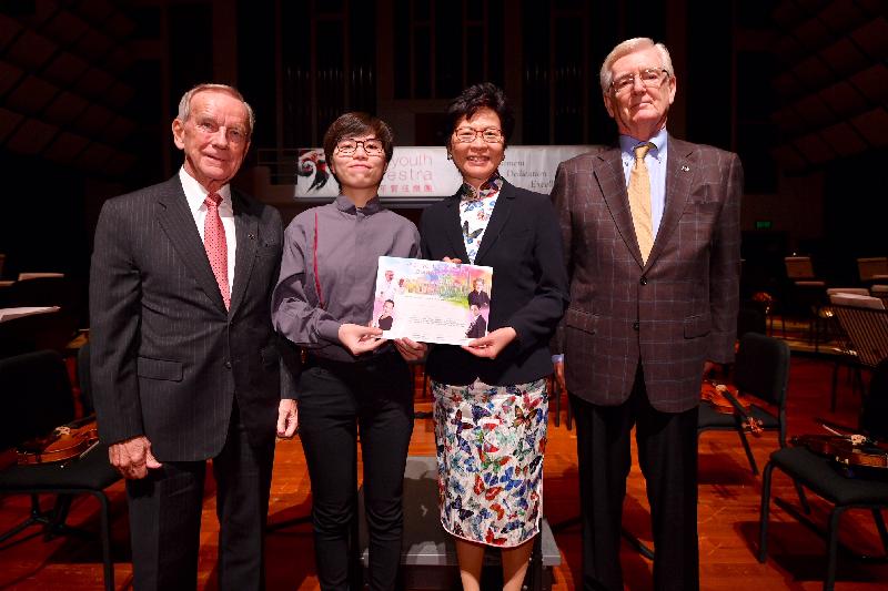 The Chief Executive, Mrs Carrie Lam, attended the 28th Asian Youth Orchestra (AYO) Summer Festival and Rehearsal Camp opening ceremony at the Hong Kong Academy for Performing Arts this evening (July 16). Photo shows Mrs Lam (second right) presenting a scholarship certificate to an AYO representative. Also pictured are the Founder and Artistic Director of the AYO, Mr Richard Pontzious (first right); and the AYO Chairman, Mr James Thompson (first left).