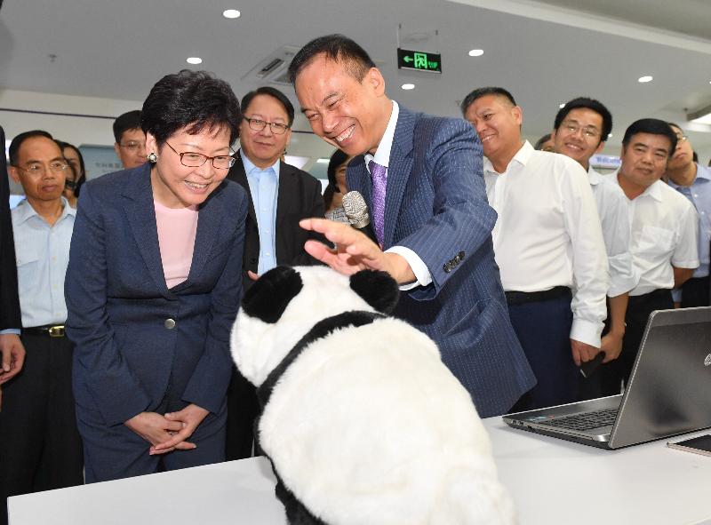 The Chief Executive, Mrs Carrie Lam, today (July 20) visited the Institute of Robotics and Intelligent Manufacturing of the Chinese University of Hong Kong, Shenzhen. Photo shows the President of the Chinese University of Hong Kong, Shenzhen, Mr Xu Yangsheng (fifth left), introducing a robot panda to Mrs Lam (third left). Looking on are the Director of the Chief Executive's Office, Mr Chan Kwok-ki (fourth left); the Director of the Hong Kong Economic and Trade Office in Guangdong of the Government of the Hong Kong Special Administrative Region, Mr Albert Tang (first left); and the Vice Mayor of the Shenzhen Municipal Government, Mr Wang Lixin (third right).