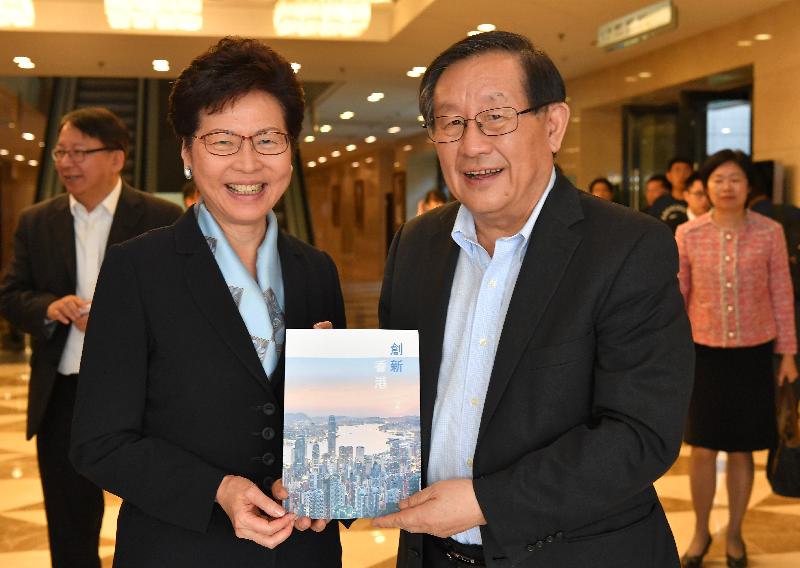 The Chief Executive, Mrs Carrie Lam, had a breakfast meeting with Vice-Chairman of the National Committee of the Chinese People's Political Consultative Conference and President of the China Association for Science and Technology Professor Wan Gang in Beijing this morning (July 26). Photo shows Mrs Lam (left) presenting a book entitled Innovation Hong Kong compiled by the Innovation and Technology Bureau to Professor Wan (right) during the meeting.
