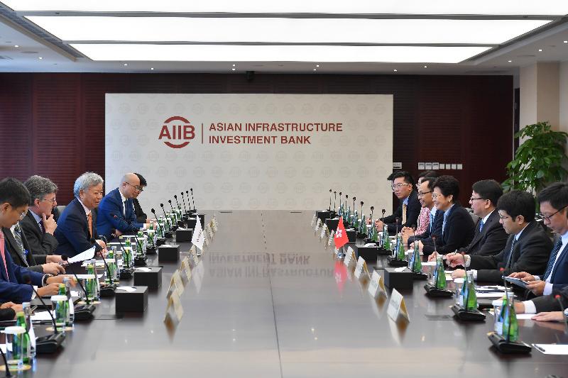 The Chief Executive, Mrs Carrie Lam, met with the President of the Asian Infrastructure Investment Bank, Mr Jin Liqun (third left), in Beijing today (July 26). Photo shows (from sixth right) the Director of the Office of the Government of the Hong Kong Special Administrative Region in Beijing, Ms Gracie Foo; the Secretary for Constitutional and Mainland Affairs, Mr Patrick Nip; Mrs Lam; and the Director of the Chief Executive's Office, Mr Chan Kwok-ki; at the meeting.