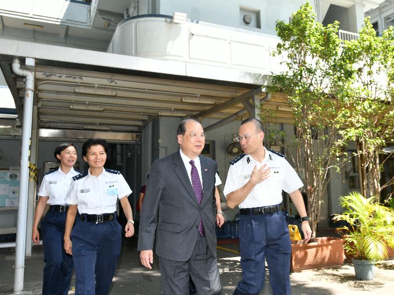 The Chief Secretary for Administration, Mr Matthew Cheung Kin-chung (second right), accompanied by the District Commander (Sham Shui Po), Mr Tony Ho (first right), tours Sham Shui Po Police Station, a Grade II Historic Building, today (July 31).