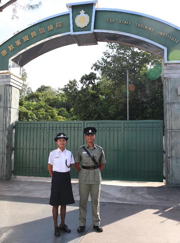 The Correctional Services Department held a passing-out parade at the Staff Training Institute in Stanley today (August 2). Photo shows Assistant Officer II Ms Liu Choi-shing (left) and Assistant Officer II Mr Chan Hei-yee (right), who spoke to the media after the parade.