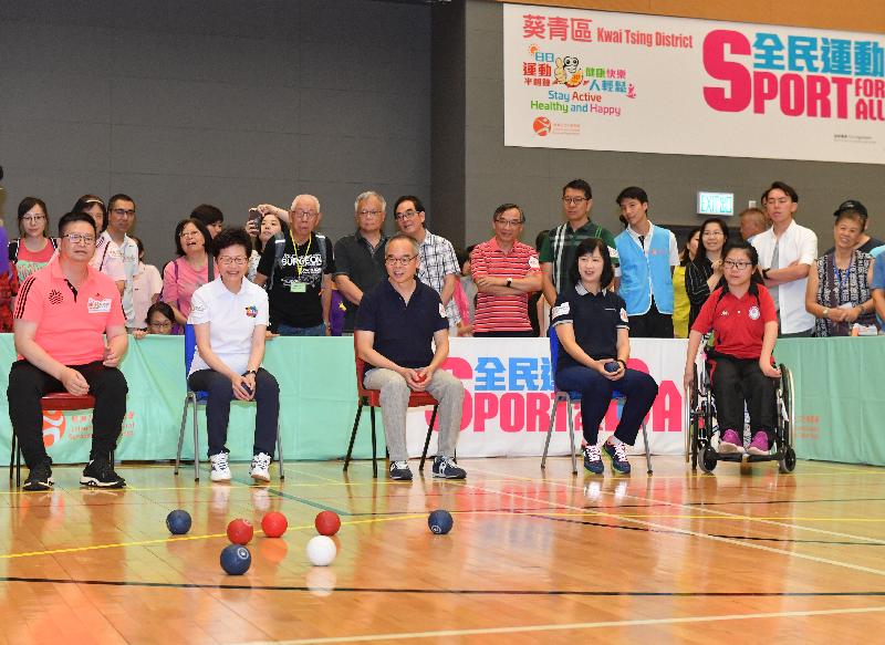 The Chief Executive, Mrs Carrie Lam, joined the public for healthy activities at Tsing Yi Southwest Sports Centre this afternoon (August 5) as part of Sport For All Day 2018 organised by the Leisure and Cultural Services Department. Picture shows Mrs Lam (second left, front row); the Secretary for Home Affairs, Mr Lau Kong-wah (centre, front row); and the Director of Leisure and Cultural Services, Ms Michelle Li (second right, front row); taking part in a boccia session for players including persons with disabilities. 