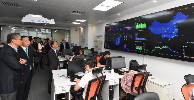 The Financial Secretary, Mr Paul Chan (first left), today (August 7) in Shenzhen visits a financial technologies company founded by Hong Kong people. 
