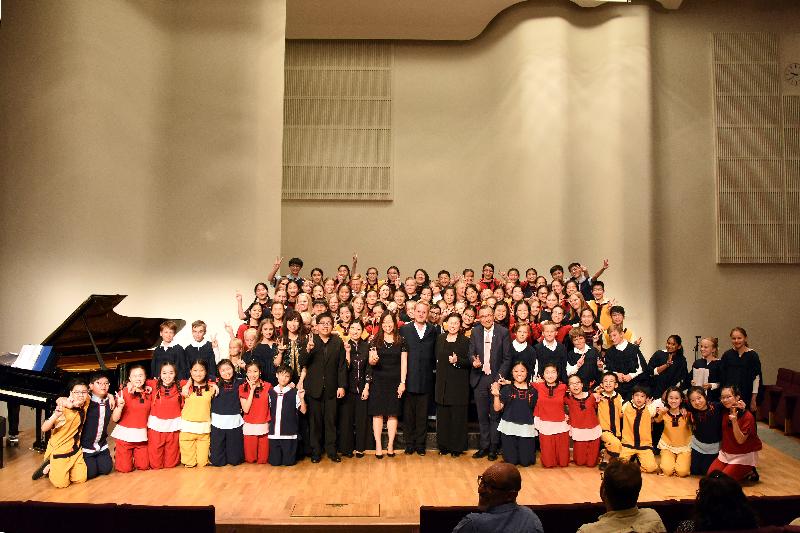 The Hong Kong Economic and Trade Office, London (London ETO) promoted Hong Kong's thriving arts and cultural life by co-presenting a concert with the Hong Kong Children's Choir at the Finlandia Chamber Music Hall in Helsinki, Finland, on August 6 (Helsinki time). Photo shows the Director-General of the London ETO, Ms Priscilla To (eleventh left, front row), with the Hong Kong Children's Choir and the Tapiola Choir and the two choirs' conductors.