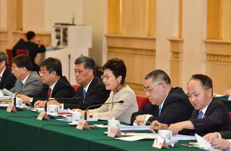 The Chief Executive, Mrs Carrie Lam (third right), attended the first plenary meeting of the leading group for the development of the Guangdong-Hong Kong-Macao Greater Bay Area as a member in Beijing today (August 15). The meeting was hosted and convened by the Vice Premier of the State Council, Mr Han Zheng.