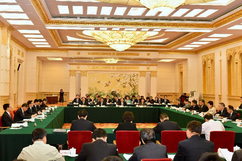 The Chief Executive, Mrs Carrie Lam (third right), attended the first plenary meeting of the leading group for the development of the Guangdong-Hong Kong-Macao Greater Bay Area as a member in Beijing today (August 15). The meeting was hosted and convened by the Vice Premier of the State Council, Mr Han Zheng (third left). 