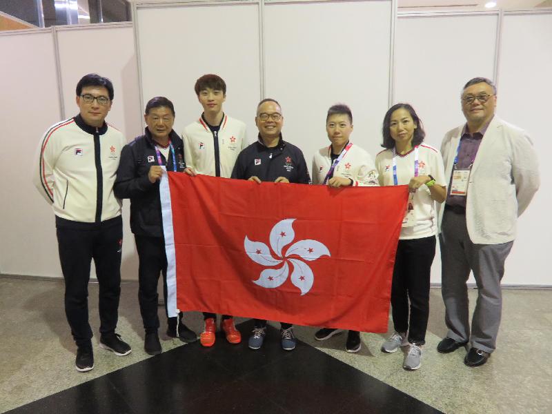 The Secretary for Home Affairs, Mr Lau Kong-wah (centre), today (August 20) extended his congratulations to Hong Kong athletes Liu Yan-wai (third right) and Low Ho-tin (third left). The two athletes each won a bronze medal respectively in Women's Individual Foil and Men's Individual Sabre of the Asian Games. Looking on is head coach of Hong Kong fencing team, Mr Zheng Kang-zhao (first left).