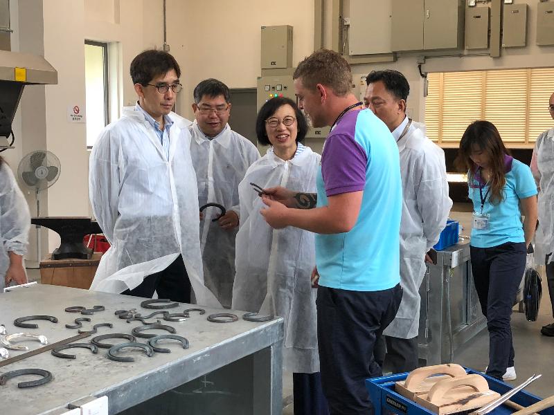 The Secretary for Food and Health, Professor Sophia Chan, today (August 28) attended the opening ceremony of the Hong Kong Jockey Club Conghua Racecourse in Conghua, Guangdong. Picture shows Professor Chan (third left) visiting the Farrier Forge before the ceremony. Next to her are the Permanent Secretary for Food and Health (Food), Mr Philip Yung (first left), and the Director of Agriculture, Fisheries and Conservation, Dr Leung Siu-fai (second left).