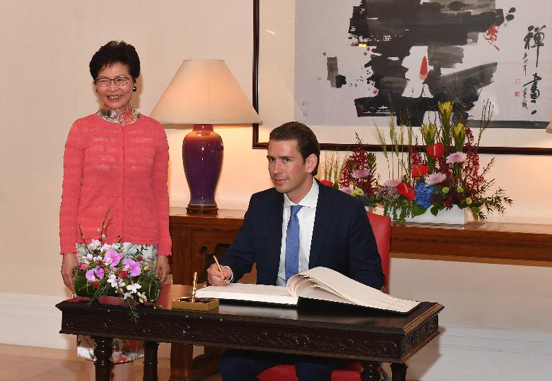 The Chief Executive, Mrs Carrie Lam (left), met the visiting Federal Chancellor of Austria, Mr Sebastian Kurz, at Government House today (August 31). Photo shows Mr Kurz (right) signing the guest book at Government House.