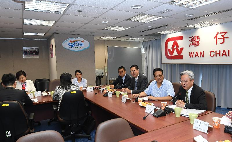 The Secretary for the Civil Service, Mr Joshua Law, and the Secretary for Education, Mr Kevin Yeung, visited Wan Chai District today (September 3). Photo shows Mr Law (first right), and Mr Yeung (third right) accompanied by the Chairman of the Wan Chai District Council (WCDC), Mr Stephen Ng (second right), and the District Officer (Wan Chai), Mr Rick Chan (fourth right), meeting with WCDC members to exchange views on issues of concern.