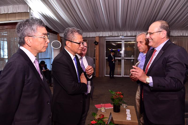 The Financial Secretary, Mr Paul Chan (second left), yesterday (September 3, Israel time) met with representatives of a few Israeli I&T companies during his visit to Israel. Also joining were the Secretary for Financial Services and Treasury, Mr James Lau (first left), and the Director-General of Investment Promotion, Mr Stephen Phillips (third left).