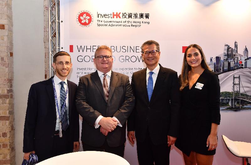 The Financial Secretary, Mr Paul Chan (second right), yesterday (September 4, Israel time) visited the booth of Invest Hong Kong at the 6th Annual Summit for Business with China in Tel Aviv, Israel. Also present is the Director-General of Investment Promotion, Mr Stephen Phillips (second left).