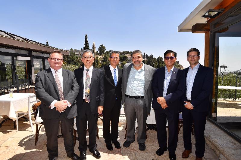 The Financial Secretary, Mr Paul Chan, attended a luncheon hosted by an Israeli equity crowdfunding platform to learn more about its operation yesterday (September 4, Israel time). Photo shows Mr Paul Chan (third left) with the Secretary for Financial Services and the Treasury, Mr James Lau (second left); the Director-General of Investment Promotion, Mr Stephen Phillips (first left); the Chief Executive Officer and Founder of OurCrowd, Mr Jon MedVed (third right); and the Deputy Executive Director of the Hong Kong Trade Development Council, Mr Raymond Yip (second right).
