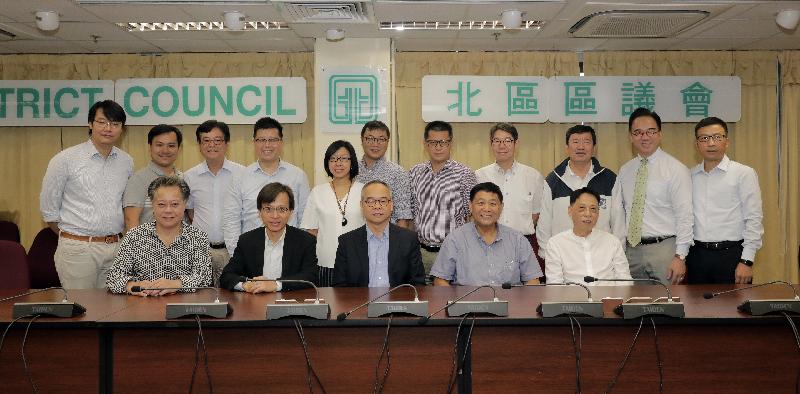 The Secretary for Home Affairs, Mr Lau Kong-wah, met with North District Council (NDC) members to exchange views on district issues when visiting North District today (September 6). Mr Lau (front row, centre) is pictured with the Chairman of NDC, Mr So Sai-chi (front row, second right); the Vice Chairman of NDC, Mr Li Kwok-fung (front row, first right); the District Officer (North), Mr Chong Wing-wun (front row, second left), and other members of NDC.