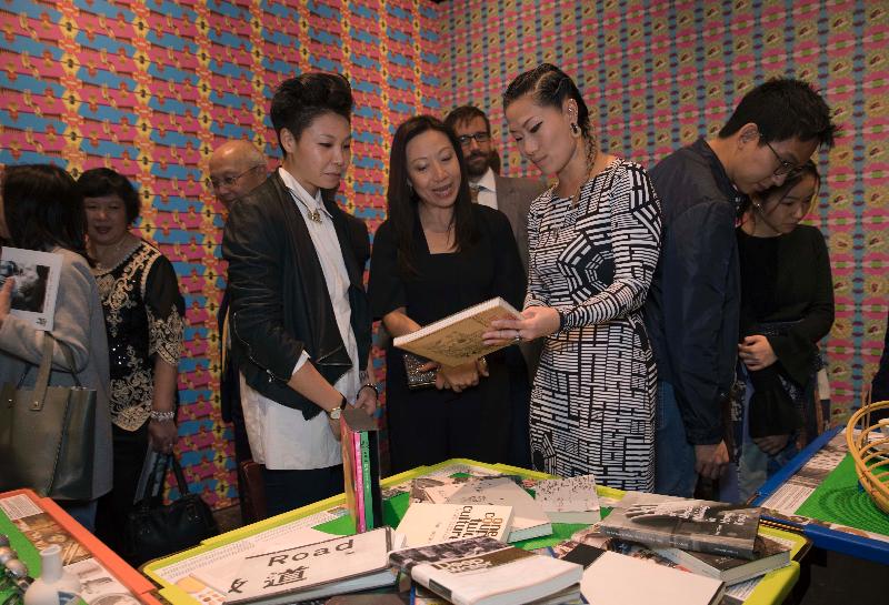 The Director-General of the Hong Kong Economic and Trade Office, London,  Ms Priscilla To (centre), discusses the ideas of the Hong Kong Pavilion with the design team, Wendy Fok of WE-DESIGNS (left) and Elaine Young of LAByrinth PROJECT (right) at Somerset House yesterday (September  5, London Time).