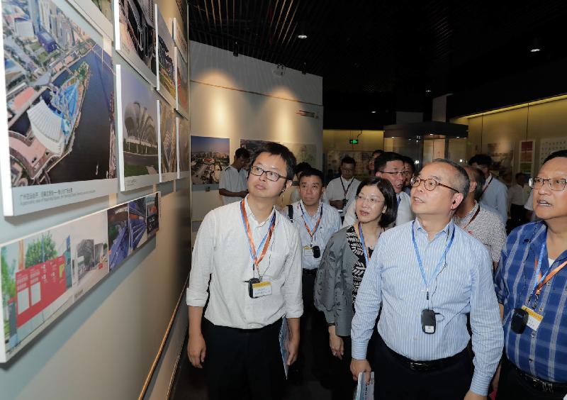 The Secretary for Home Affairs, Mr Lau Kong-wah, District Council chairmen and vice chairmen visited the Guangdong-Hong Kong-Macao Greater Bay Area today (September 7). Photo shows Mr Lau (second right), the Director of Home Affairs, Miss Janice Tse (third right), and members of the delegation looking at display boards inside the Museum of Guangzhou Asian Games and Guangzhou Asian Para Games.