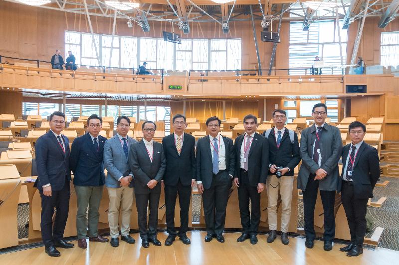 The delegation of the Legislative Council tours the Scottish Parliament Building.  Delegation members pose for a group photo in the Debating Chamber of the Scottish Parliament, (from left) Mr Andrew Wan, Mr Alvin Yeung, Mr Charles Mok, Mr Kenneth Leung (deputy leader), Mr Ip Kin-yuen (leader), Dr Junius Ho, Mr Chung Kwok-pan, Mr Luk Chung-hung, Mr Lam Cheuk-ting and Mr Au Nok-hin.
