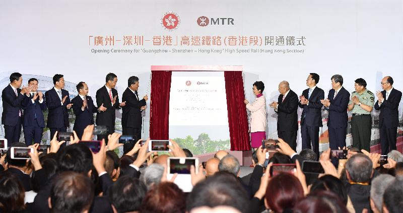 The Chief Executive, Mrs Carrie Lam, attended the Opening Ceremony for "Guangzhou-Shenzhen-Hong Kong" High Speed Rail (Hong Kong Section) held at the Hong Kong West Kowloon Station today (September 22). Photo shows Mrs Lam (sixth right) and the Governor of Guangdong Province, Mr Ma Xingrui (sixth left), unveiling a plaque. Witnessing the unveiling are the Non-executive Chairman of the MTR Corporation, Professor Frederick Ma (first left); the Secretary of the CPC Shenzhen Municipal Committee, Mr Wang Weizhong (second left); the Commissioner of the Ministry of Foreign Affairs of the People's Republic of China in the Hong Kong Special Administrative Region (HKSAR), Mr Xie Feng (third left); the Director of the Liaison Office of the Central People's Government in the HKSAR, Mr Wang Zhimin (fourth left); Vice-Chairman of the National Committee of the Chinese People's Political Consultative Conference (CPPCC) Mr C Y Leung (fifth left); Vice-Chairman of the National Committee of the CPPCC Mr Tung Chee Hwa (fifth right); the Director of the Hong Kong and Macao Affairs Office of the State Council, Mr Zhang Xiaoming (fourth right); the General Manager of China Railway Corporation, Mr Lu Dongfu (third right); the Commander-in-chief of the Chinese People's Liberation Army Hong Kong Garrison, Mr Tan Benhong (second right); and the Secretary for Transport and Housing, Mr Frank Chan Fan (first right).