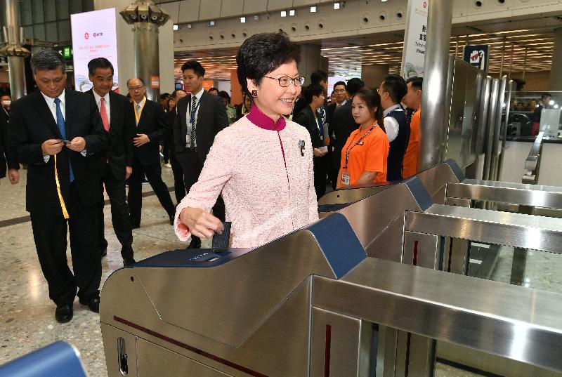 The Chief Executive, Mrs Carrie Lam, leaves Hong Kong West Kowloon Station (WKS) for Guangzhounan Station on the Vibrant Express train after attending the Opening Ceremony for "Guangzhou-Shenzhen-Hong Kong" High Speed Rail (Hong Kong Section) held at the WKS today (September 22).
