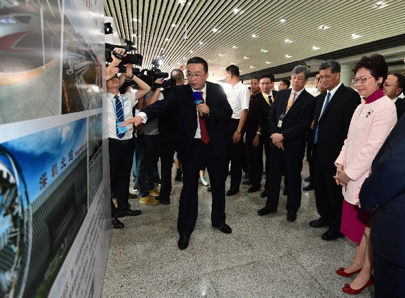 The Chief Executive, Mrs Carrie Lam, arrived at Guangzhounan Station after traveling on the Vibrant Express train today (September 22). Photo shows Mrs Lam (first right); the Governor of Guangdong Province, Mr Ma Xingrui (second right); the General Manager of China Railway Corporation, Mr Lu Dongfu (third right); and other guests receiving a briefing on railway development in the Pearl River Delta region. 