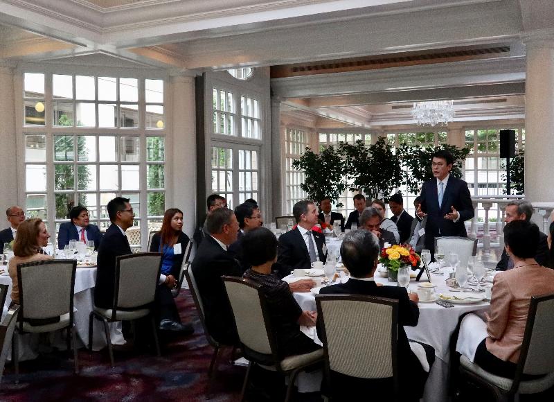 The Secretary for Commerce and Economic Development, Mr Edward Yau (standing), attends a luncheon organised by the United States (US)-China Business Council in Washington, DC, the US, today (September 25, Eastern Standard Time).
