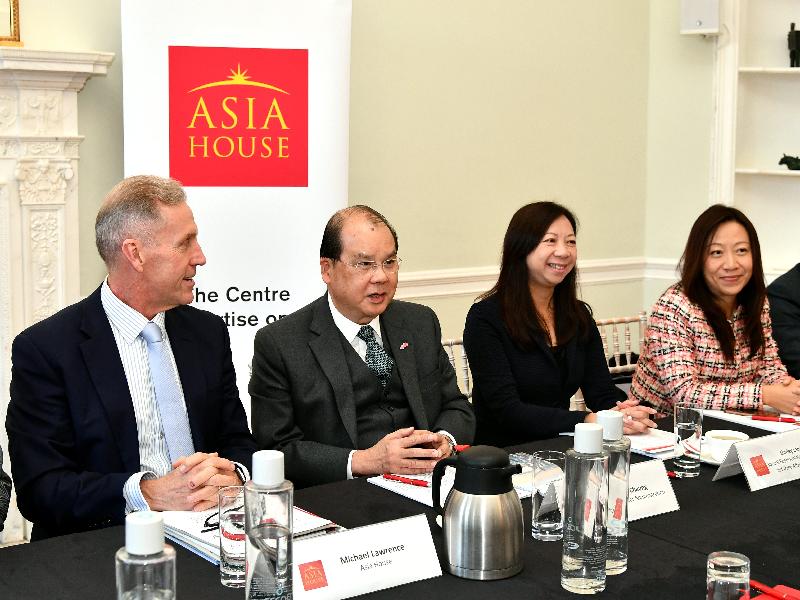 The Chief Secretary for Administration, Mr Matthew Cheung Kin-chung (second left), today (September 27, London time) attends Asia House's roundtable discussion in London, the United Kingdom. Also present are the Chief Executive of Asia House, Mr Michael Lawrence (first left); the Director-General of the Hong Kong Economic and Trade Office, London, Ms Priscilla To (first right); and the Special Representative for Hong Kong Economic and Trade Affairs to the European Union, Ms Shirley Lam (second right).