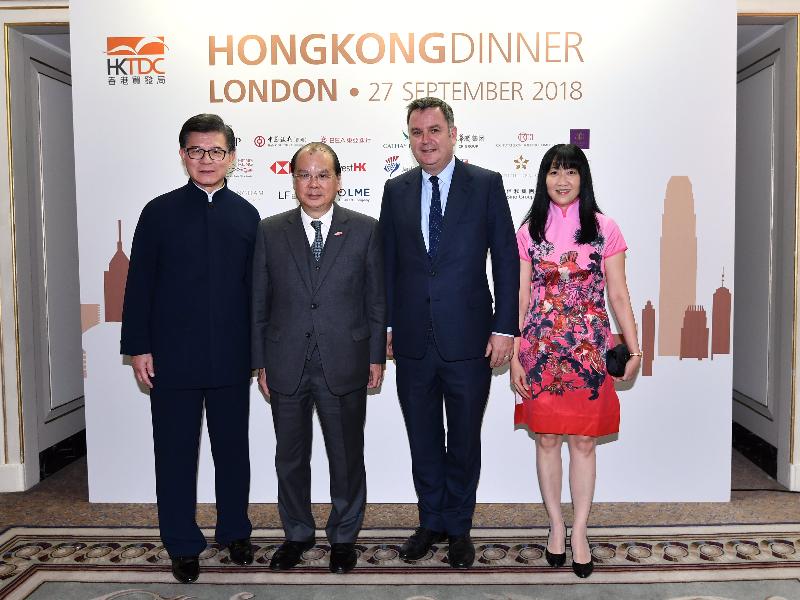 The Chief Secretary for Administration, Mr Matthew Cheung Kin-chung, today (September 27, London time) attended the 35th Hong Kong Dinner organised by the Hong Kong Trade Development Council in London, the United Kingdom (UK), to celebrate the long and close business and trade relationship between Hong Kong and the UK. Mr Cheung (second left) is pictured with the Chairman of the Hong Kong Trade Development Council (HKTDC), Mr Vincent Lo (first left) ; the Financial Secretary to the Treasury and Paymaster General, Mr Mel Stride (second right); and the Executive Director of HKTDC, Ms Margaret Fong (first right).