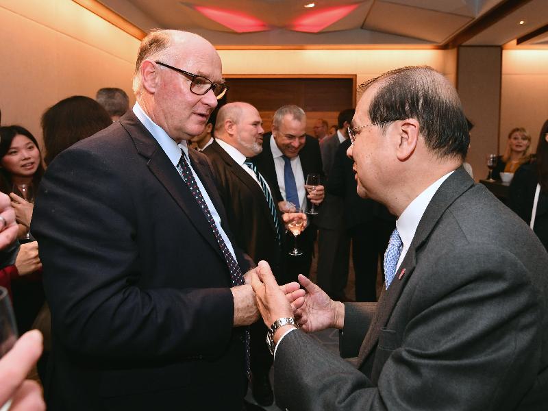 The Chief Secretary for Administration, Mr Matthew Cheung Kin-chung, today (September 28, London time) addresses a luncheon organised by Hong Kong Association in London, the United Kingdom. Picture shows Mr Cheung (right) shaking hands with Chairman of Hong Kong Association, Mr Douglas Flint (left).

