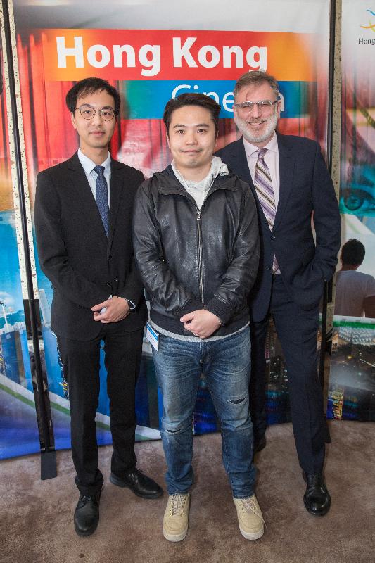 The Acting Director of the Hong Kong Economic and Trade Office in San Francisco, Mr Michael Yau (left); the Executive Director of SFFILM, Mr Noah Cowan (right); and Hong Kong film director Jevons Au (centre), attend the opening night reception of the eighth annual Hong Kong Cinema in San Francisco, the United States today (September 28, San Francisco time).